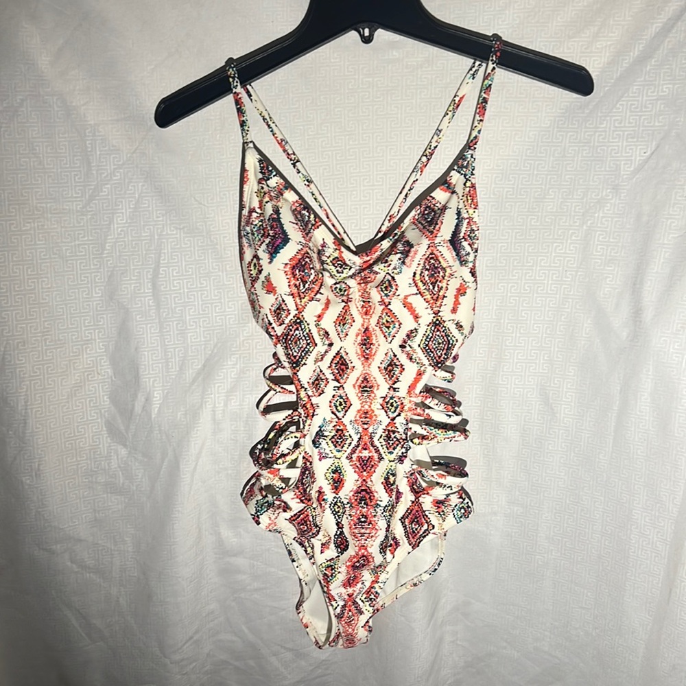 One piece swimsuit with cut out sides